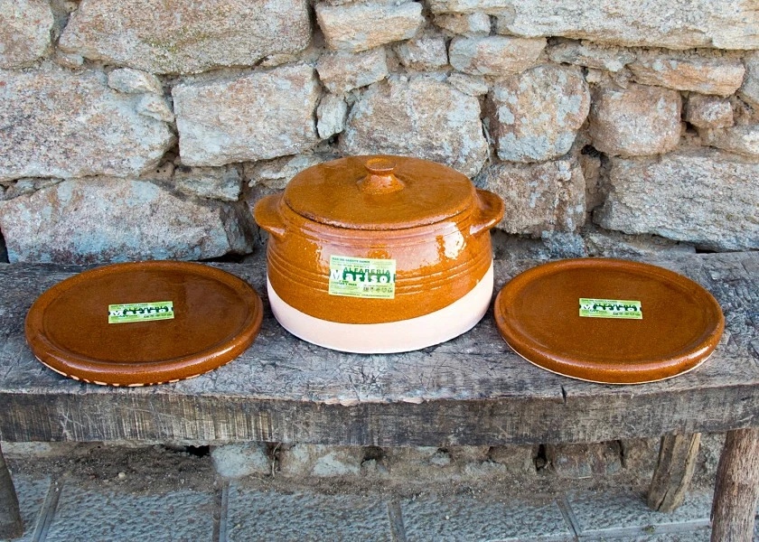 Set of pan and dishes